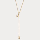 Golden Delphi Cross Pearl Lariat