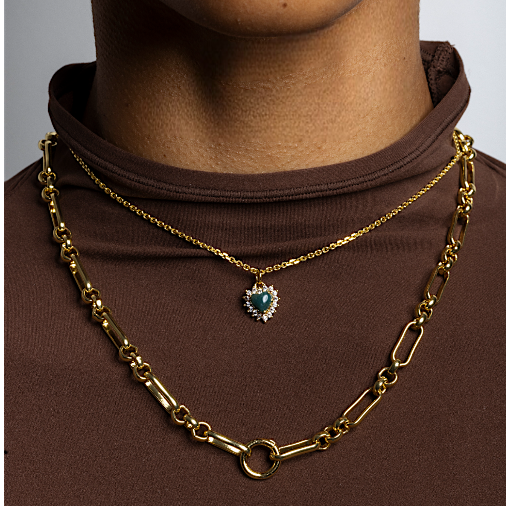 eros_necklace_and_tria_charm_chain-Photoroom.png